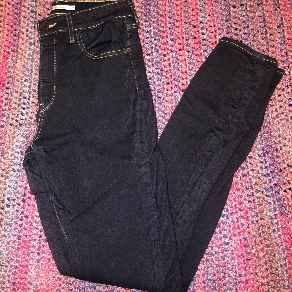721 High Rise Skinny Jeans